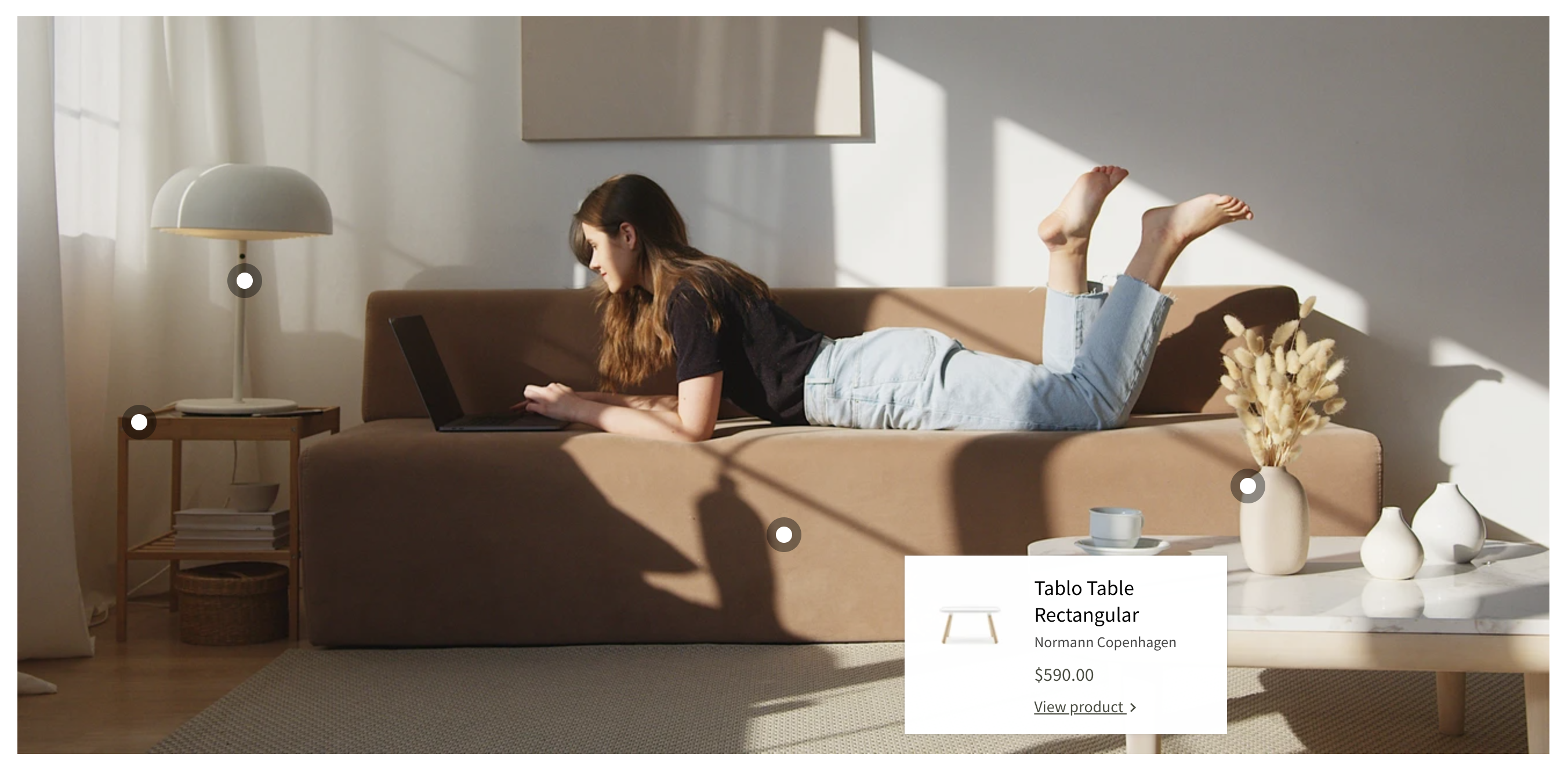 shoppable image with living room image and various products.png